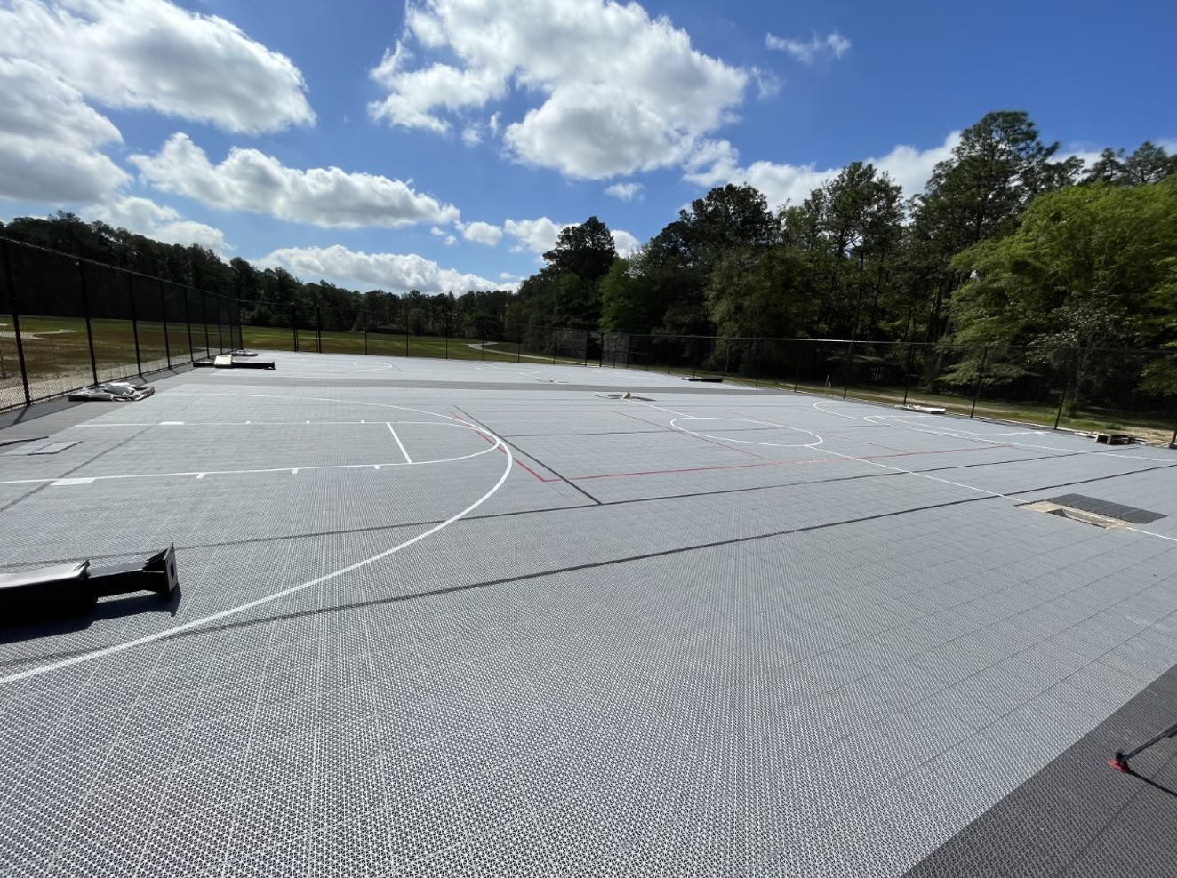 New multi-use courts under construction at Chickasabogue Park. Featuring a VersaCourt base configured for basketball, tennis or pickleball