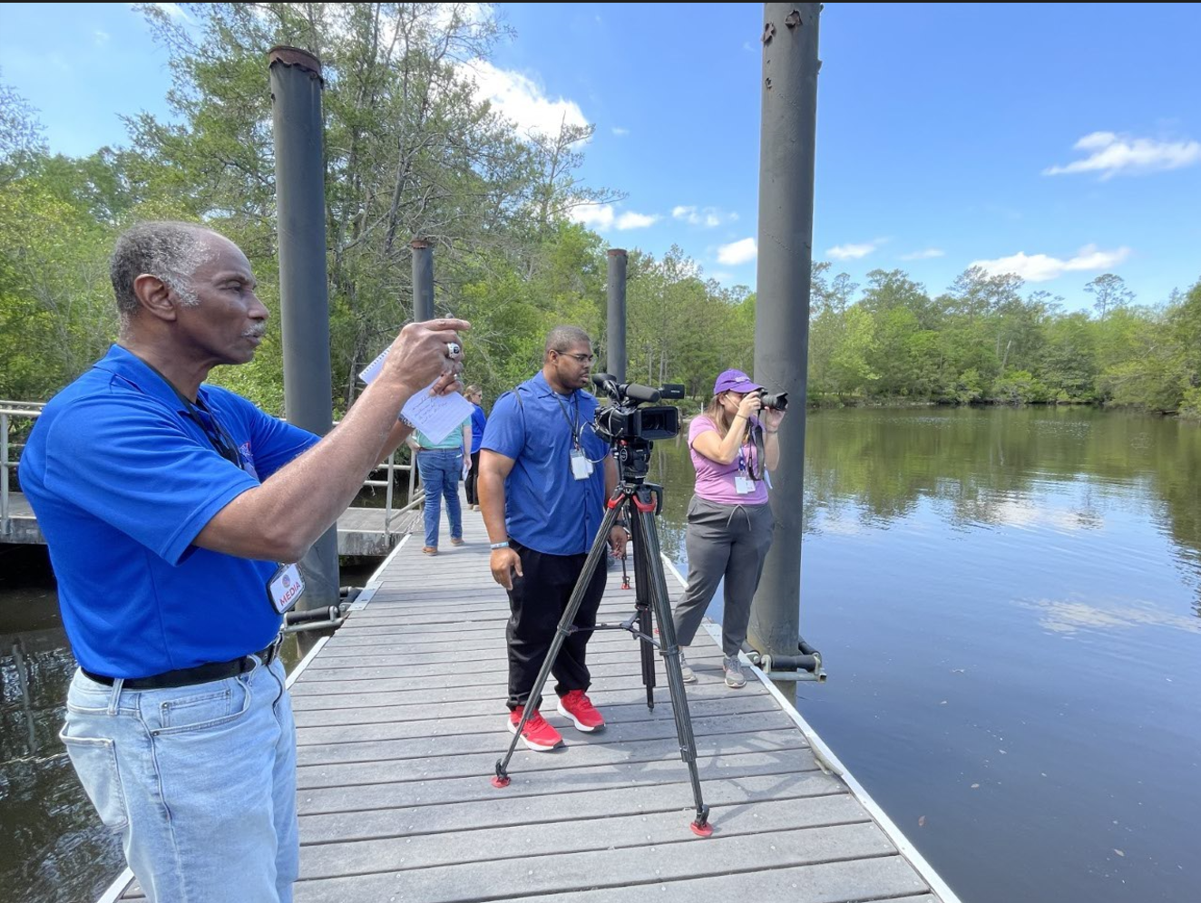 photo of media representatives on Chickasabogue Park's floating dock